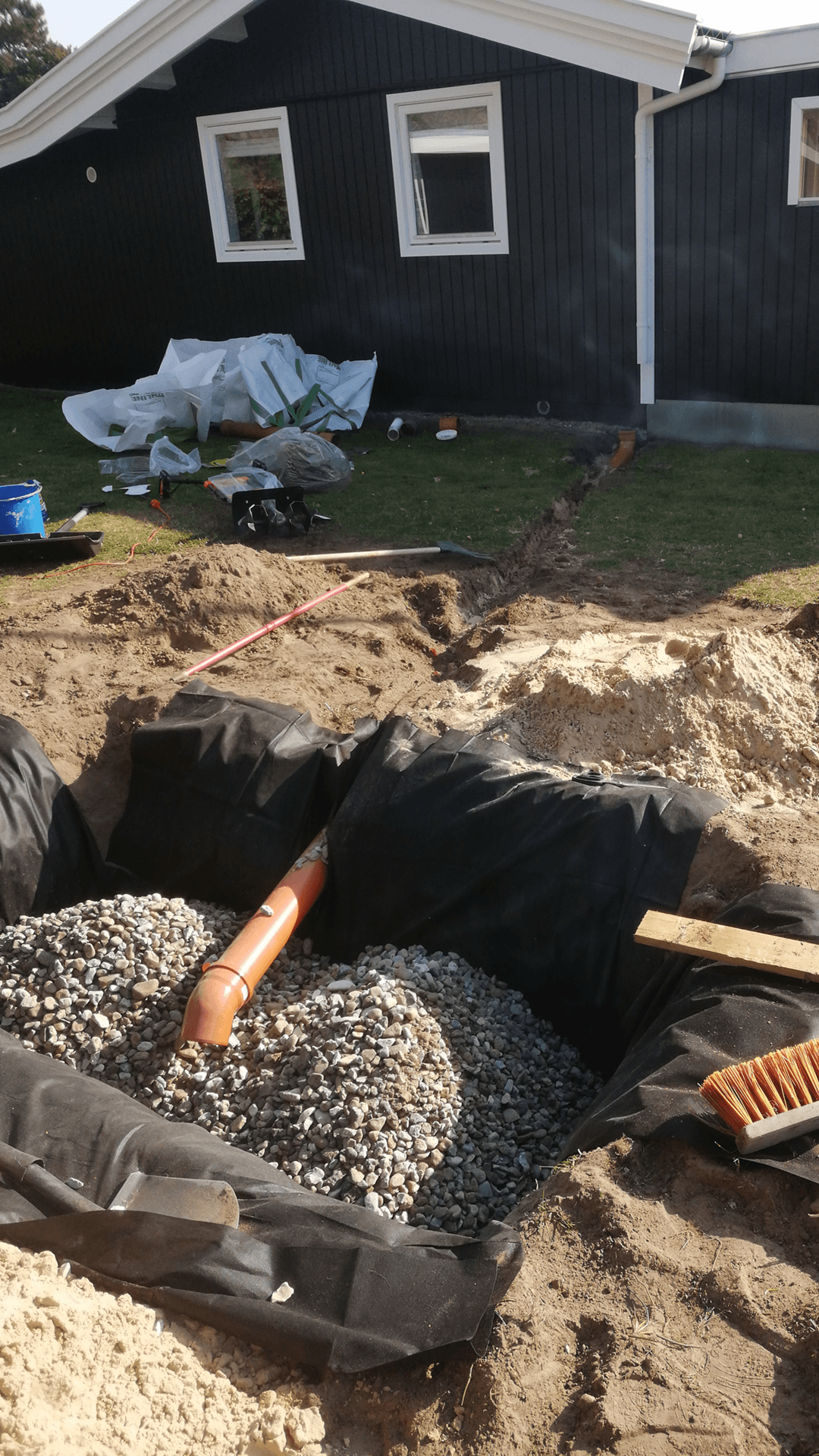 Etablering af regnvandsfaskine i sommerhus